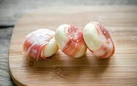 PROSCIUTTO WRAPPED BRI BITES (25 pieces per order) | Yellow Rose Catering